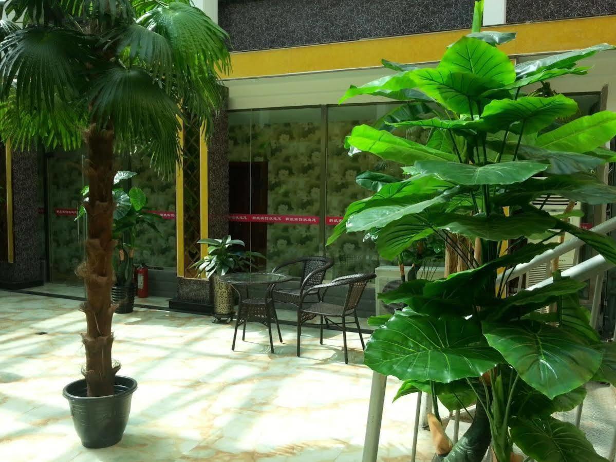 Xinhang Hotel Urumqi Exterior photo